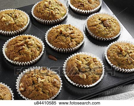 Stock Photography - Avocado zucchini muffins. Fotosearch