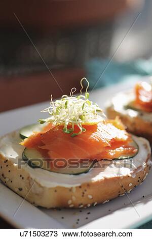 Stock Image - Bagel Served With Smoked Salmon And Cream Cheese. Fotosearch