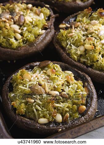 Baked pesto stuffed mushrooms in a roasting tin View Large Photo Image Stock Image - Baked pesto stuffed mushrooms in a roasting tin. Fotosearch