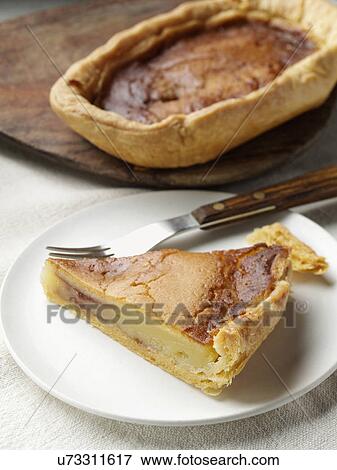 Stock Photo - Bakewell pudding slice. Fotosearch
