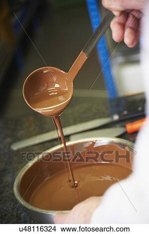 Picture - Belgian Chocolatier Preparing Chocolate. Fotosearch