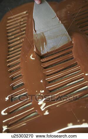 Belgian Chocolatier Preparing Chocolate View Large Photo Image Stock Image - Belgian Chocolatier Preparing Chocolate. Fotosearch