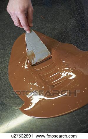 Stock Image - Belgian Chocolatier Preparing Chocolate. Fotosearch