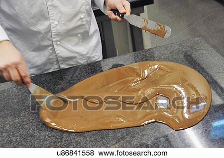 Belgian Chocolatier Preparing Chocolate View Large Photo Image Stock Photo - Belgian Chocolatier Preparing Chocolate. Fotosearch