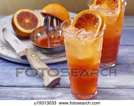 Stock Image - Blood orange ginger ale. Fotosearch