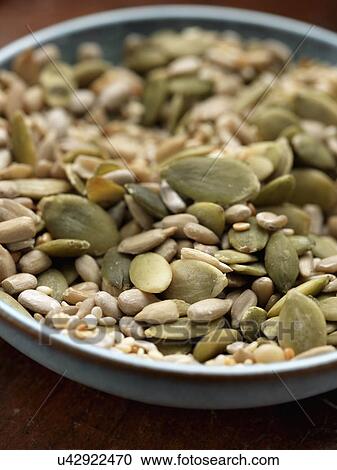 Blue bowl of seeds View Large Photo Image Stock Image - Blue bowl of seeds. Fotosearch