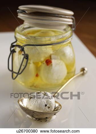 Stock Image - Boilie goat cheese. Fotosearch
