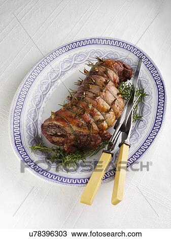 Boned roast leg of lamb slices with creamy peas and broad beans View Large Photo Image Stock Image - Boned roast leg of lamb slices with creamy peas and broad beans. Fotosearch