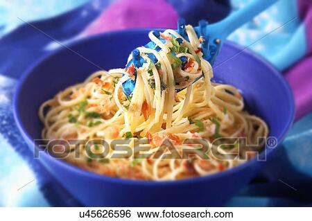 Stock Photograph - Bowl Of Homemade Crab Linguini With Chilli. Fotosearch