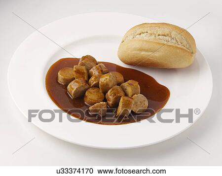 Bratwurst curry and roll View Large Photo Image Stock Image - Bratwurst curry and roll. Fotosearch
