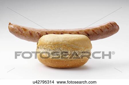 Bratwurst in a roll View Large Photo Image Picture - Bratwurst in a roll. Fotosearch