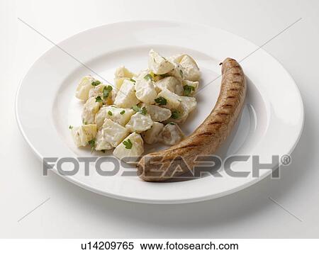 Stock Photography - Bratwurst potatoes. Fotosearch