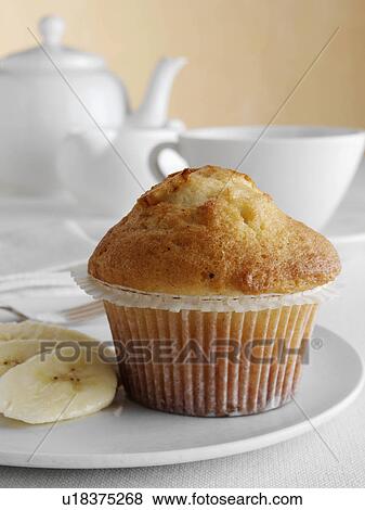 Breakfast banana muffin with fruit and tea set View Large Photo Image Stock Photo - Breakfast banana muffin with fruit and tea set. Fotosearch