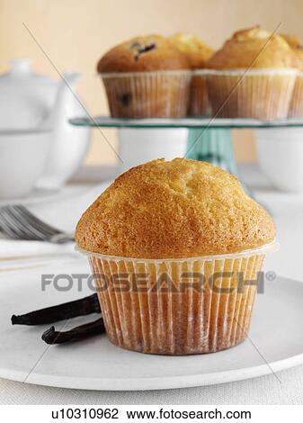 Breakfast vanilla muffin with pods and tea set View Large Photo Image Stock Image - Breakfast vanilla muffin with pods and tea set. Fotosearch