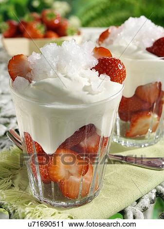 Stock Image - British strawberries Catalan cream and crushed lemonade ice. Fotosearch