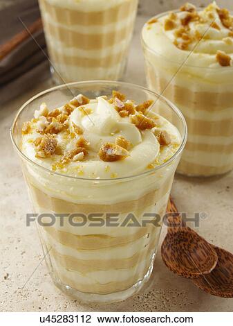 Brittle topped Vanilla butterscotch pudding parfaits View Large Photo Image Stock Image - Brittle topped Vanilla butterscotch pudding parfaits. Fotosearch
