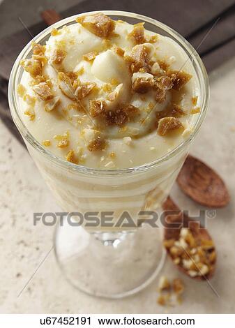Brittle topped Vanilla butterscotch pudding parfaits View Large Photo Image Stock Image - Brittle topped Vanilla butterscotch pudding parfaits. Fotosearch