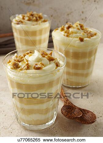 Brittle topped Vanilla butterscotch pudding parfaits View Large Photo Image Stock Photography - Brittle topped Vanilla butterscotch pudding parfaits. Fotosearch