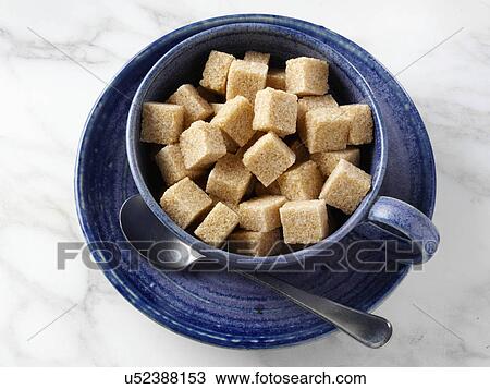 Stock Image - Brown sugar lumps. Fotosearch