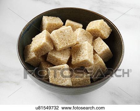 Stock Image - Brown sugar lumps. Fotosearch