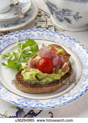 Bruschetta avocado Parma ham View Large Photo Image Stock Photography - Bruschetta avocado Parma ham. Fotosearch