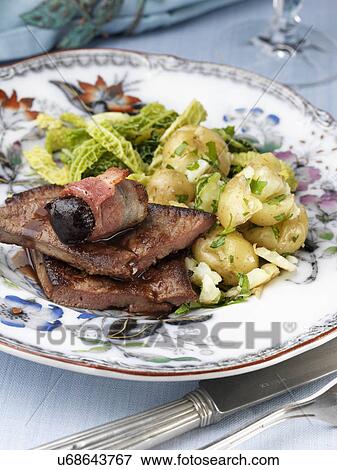 Calves liver with devils on horseback cabbage and potatoes View Large Photo Image Stock Photo - Calves liver with devils on horseback cabbage and potatoes. Fotosearch