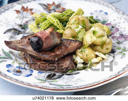Calves liver with devils on horseback cabbage and potatoes View Large Photo Image Stock Photo - Calves liver with devils on horseback cabbage and potatoes. Fotosearch