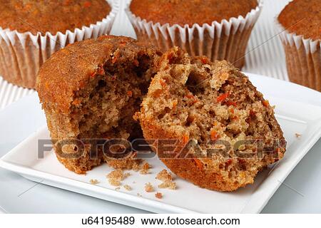 Carrot Cake Muffin Broken In Half On White Plate View Large Photo Image Stock Photo - Carrot Cake Muffin Broken In Half On White Plate. Fotosearch