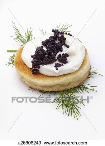 Caviar sour cream dill blini View Large Photo Image Stock Photo - Caviar sour cream dill blini. Fotosearch