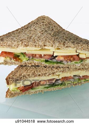 Cheese sandwich with tomato lettuce cucumber View Large Photo Image Stock Photo - Cheese sandwich with tomato lettuce cucumber. Fotosearch