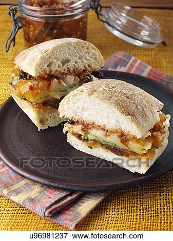 Stock Photo - Cheese sandwich with tomato pear chutney. Fotosearch