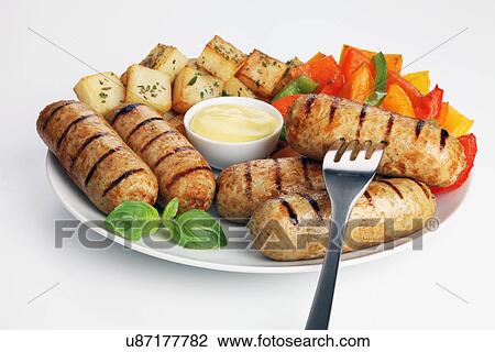 Chicken Sausages With Saute Potatoes, Roasted Peppers And Mayonnaise View Large Photo Image Stock Image - Chicken Sausages With Saute Potatoes, Roasted Peppers And Mayonnaise. Fotosearch