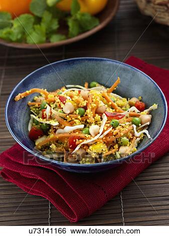 Stock Photograph - Chickpeas and peas salad. Fotosearch