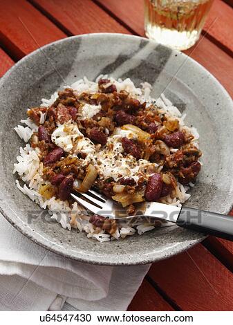 Stock Image - Chilli con carne and rice. Fotosearch