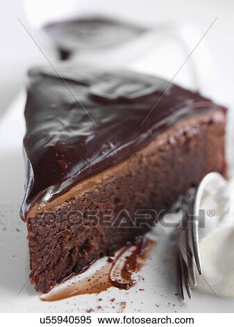 Chocolate fudge cake slice View Large Photo Image Stock Photography - Chocolate fudge cake slice. Fotosearch
