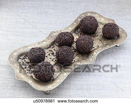 Chocolate truffles covered in vermicelli View Large Photo Image Stock Image - Chocolate truffles covered in vermicelli. Fotosearch