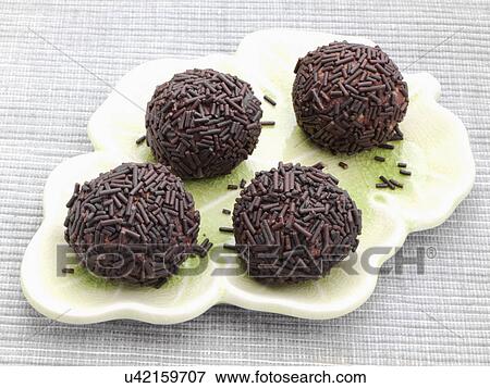 Chocolate truffles covered in vermicelli View Large Photo Image Stock Photo - Chocolate truffles covered in vermicelli. Fotosearch