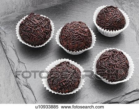 Stock Photography - Chocolate truffles covered in vermicelli. Fotosearch