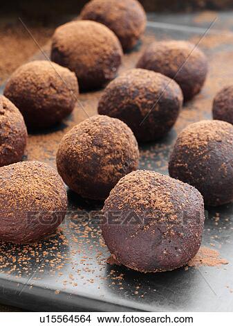 Chocolate truffles dusted with cocoa powder View Large Photo Image Picture - Chocolate truffles dusted with cocoa powder. Fotosearch
