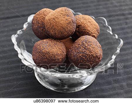 Chocolate truffles dusted with cocoa powder View Large Photo Image Stock Photo - Chocolate truffles dusted with cocoa powder. Fotosearch