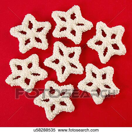 Christmas Snowflake Shaped Pretzels Covered In White Chocolate, On Red View Large Photo Image Stock Photography - Christmas Snowflake Shaped Pretzels Covered In White Chocolate, On Red. Fotosearch