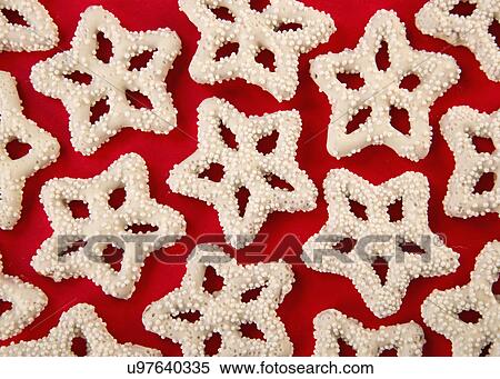 Christmas Snowflake Shaped Pretzels Covered In White Chocolate, On Red View Large Photo Image Stock Photography - Christmas Snowflake Shaped Pretzels Covered In White Chocolate, On Red. Fotosearch