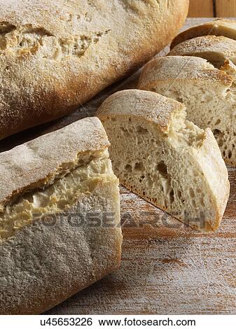 Stock Photograph - Ciabatta sliced. Fotosearch