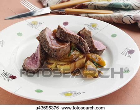 Cornbread lamb loin View Large Photo Image Stock Photograph - Cornbread lamb loin. Fotosearch