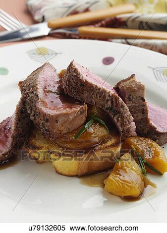 Cornbread lamb loin View Large Photo Image Stock Photography - Cornbread lamb loin. Fotosearch