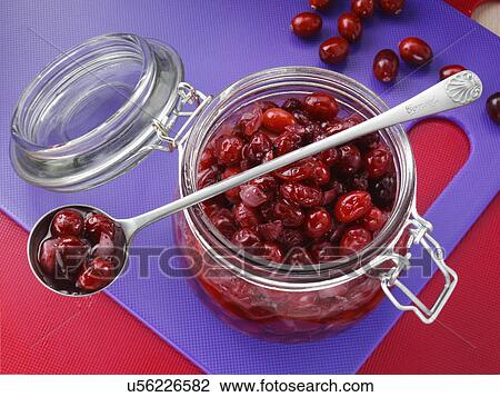 Stock Image - Cranberry shallot chutney in a kilner jar. Fotosearch