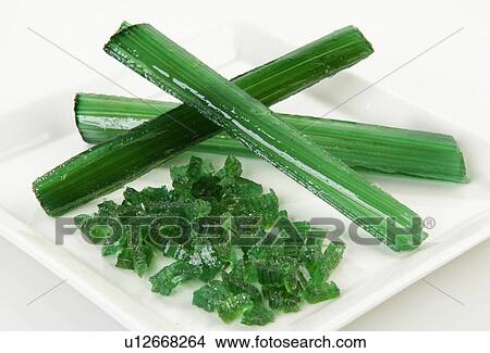 Crystallised Angelica Strips And Chopped Pieces On Square White Plate View Large Photo Image Picture - Crystallised Angelica Strips And Chopped Pieces On Square White Plate. Fotosearch