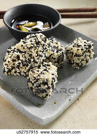 Deep fried tofu coated in black and white sesame seeds dipping sauce Japanese main meals View Large Photo Image Stock Photography - Deep fried tofu coated in black and white sesame seeds dipping sauce Japanese main meals. Fotosearch