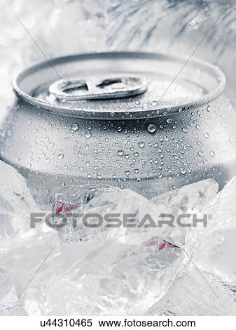 Drinks can with ring pull cooling in ice View Large Photo Image Stock Photography - Drinks can with ring pull cooling in ice. Fotosearch