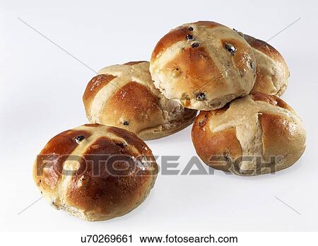Stock Image - Easter hot cross buns on a white background. Fotosearch